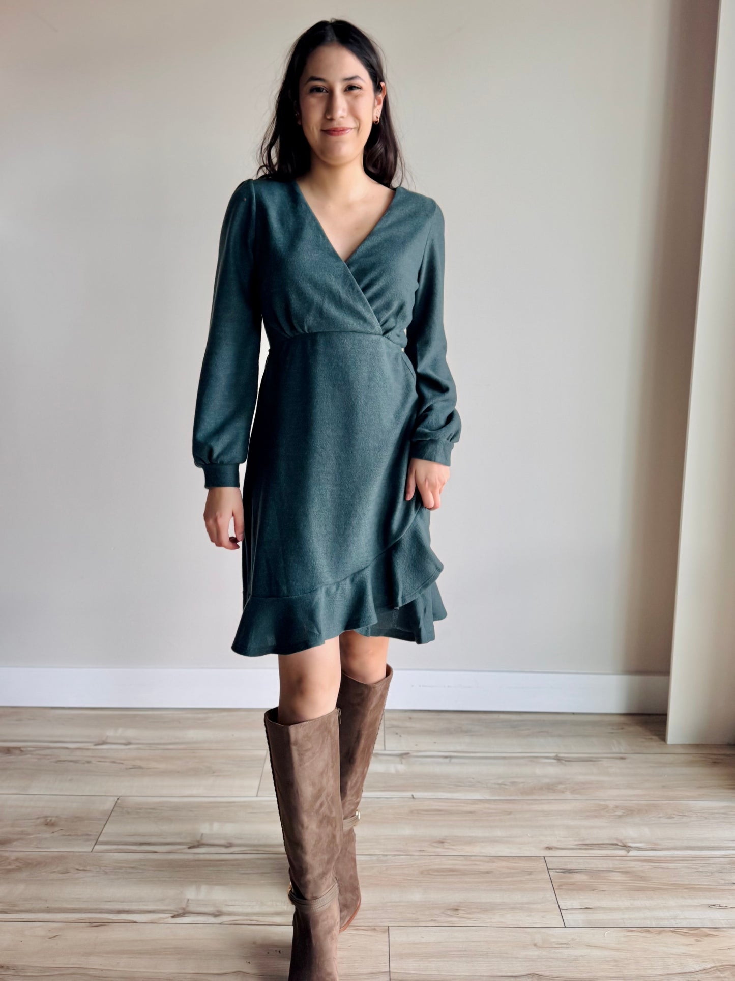 Model wearing Bridget long sleeve surplice mini dress — full body shot
