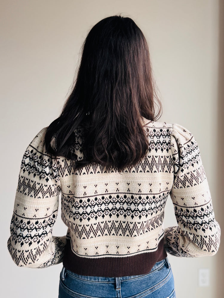 Back view of Celine sweater with fair isle pattern and semi-cropped silhouette