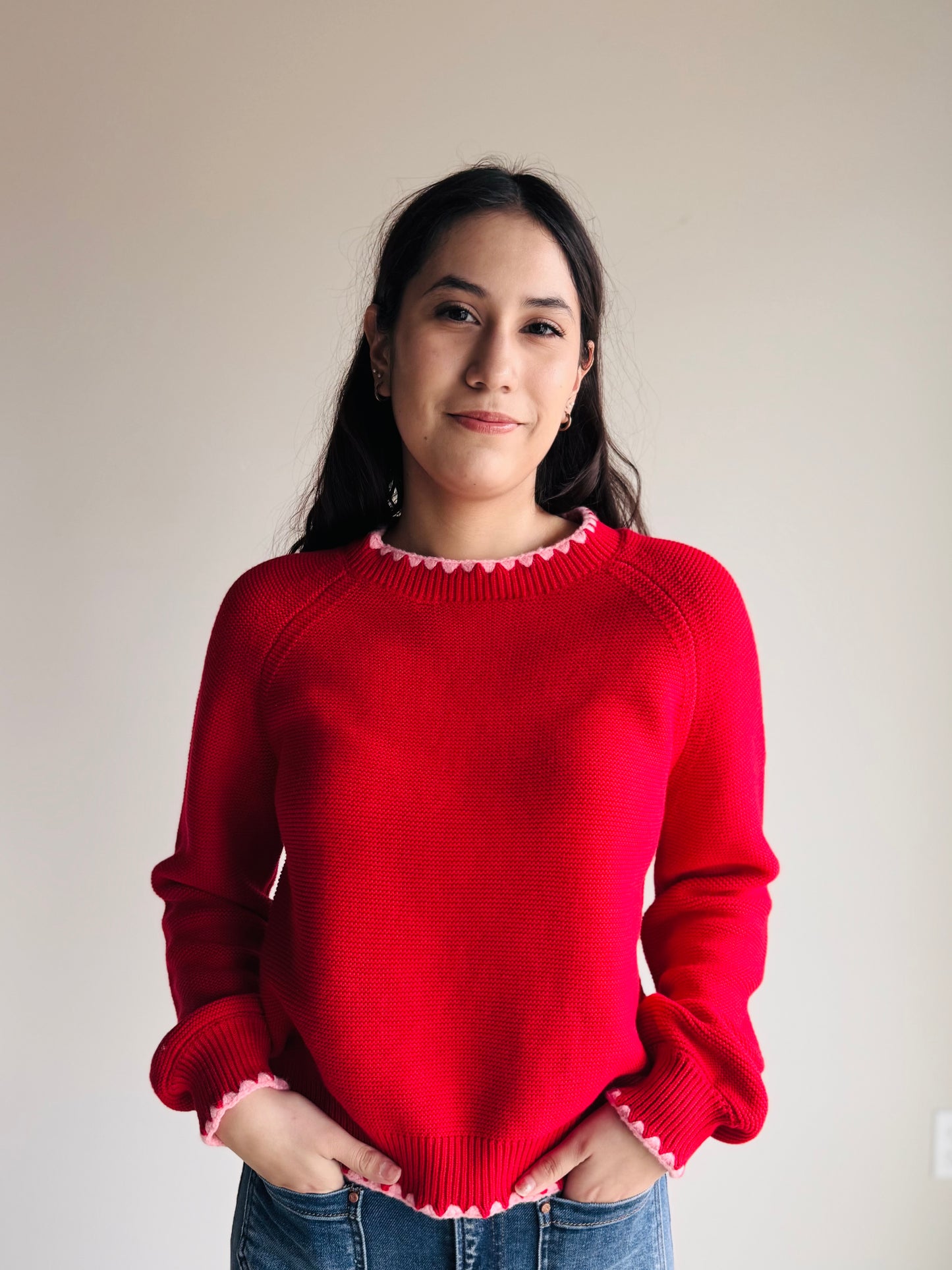 Close-up of Emmalyn contrast hem knit sweater fabric showing soft knit texture and hem detail