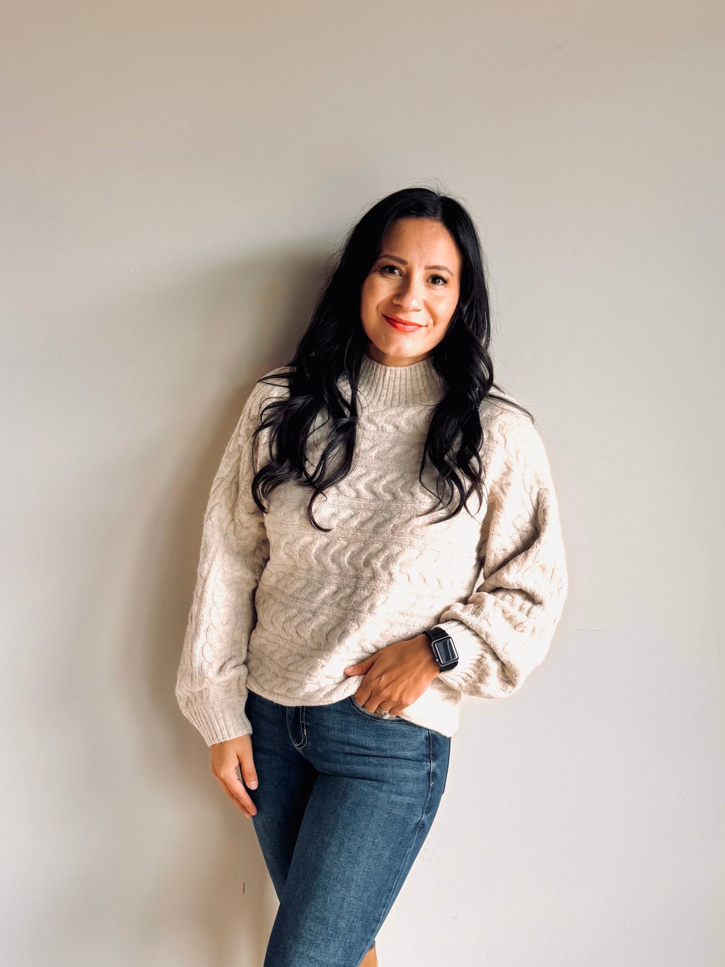 Side view of Kennedy cable knit sweater showing structured fit and cozy texture