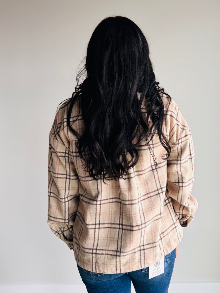 Back view of Lainey plaid shacket with long sleeves and relaxed silhouette