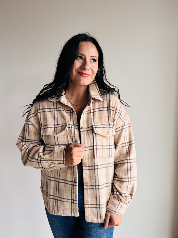 Side angle of Lainey shacket showing curved hem and tunic-length fit