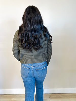 Lorelei olive turtleneck sweater — back showing clean silhouette