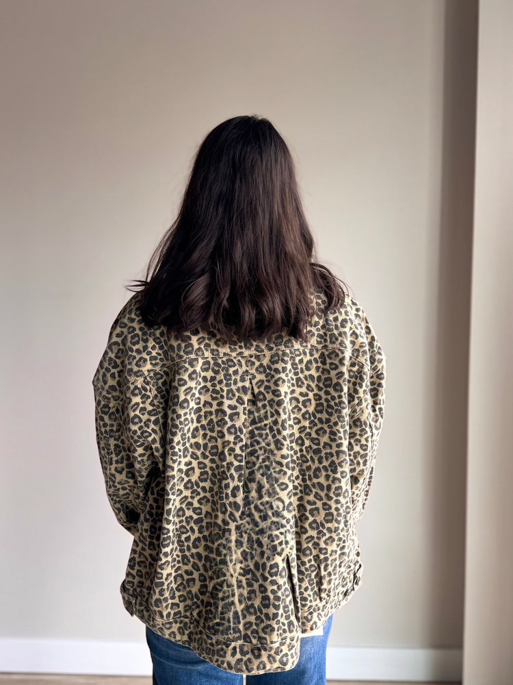 Back view of Marlow denim jacket with full animal print and relaxed silhouette