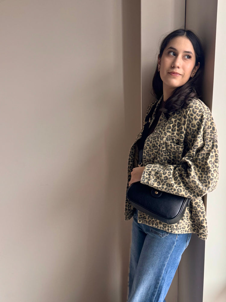 Side angle of Marlow animal print jacket showing oversized fit and long sleeves