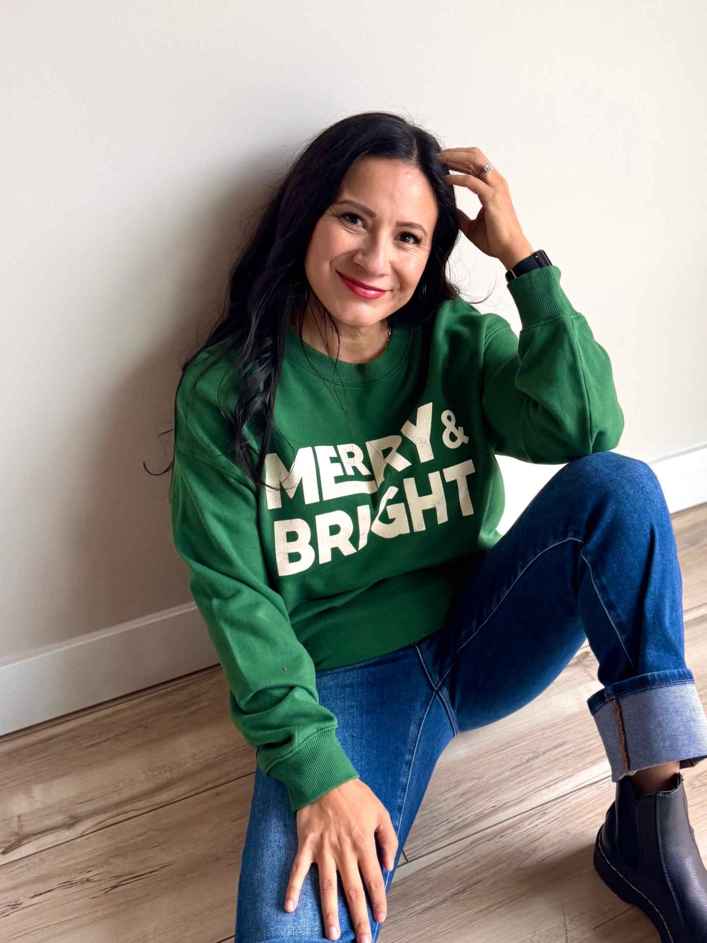 Side angle of Merry & Bright sweatshirt showing soft fleece texture and drop shoulder seam