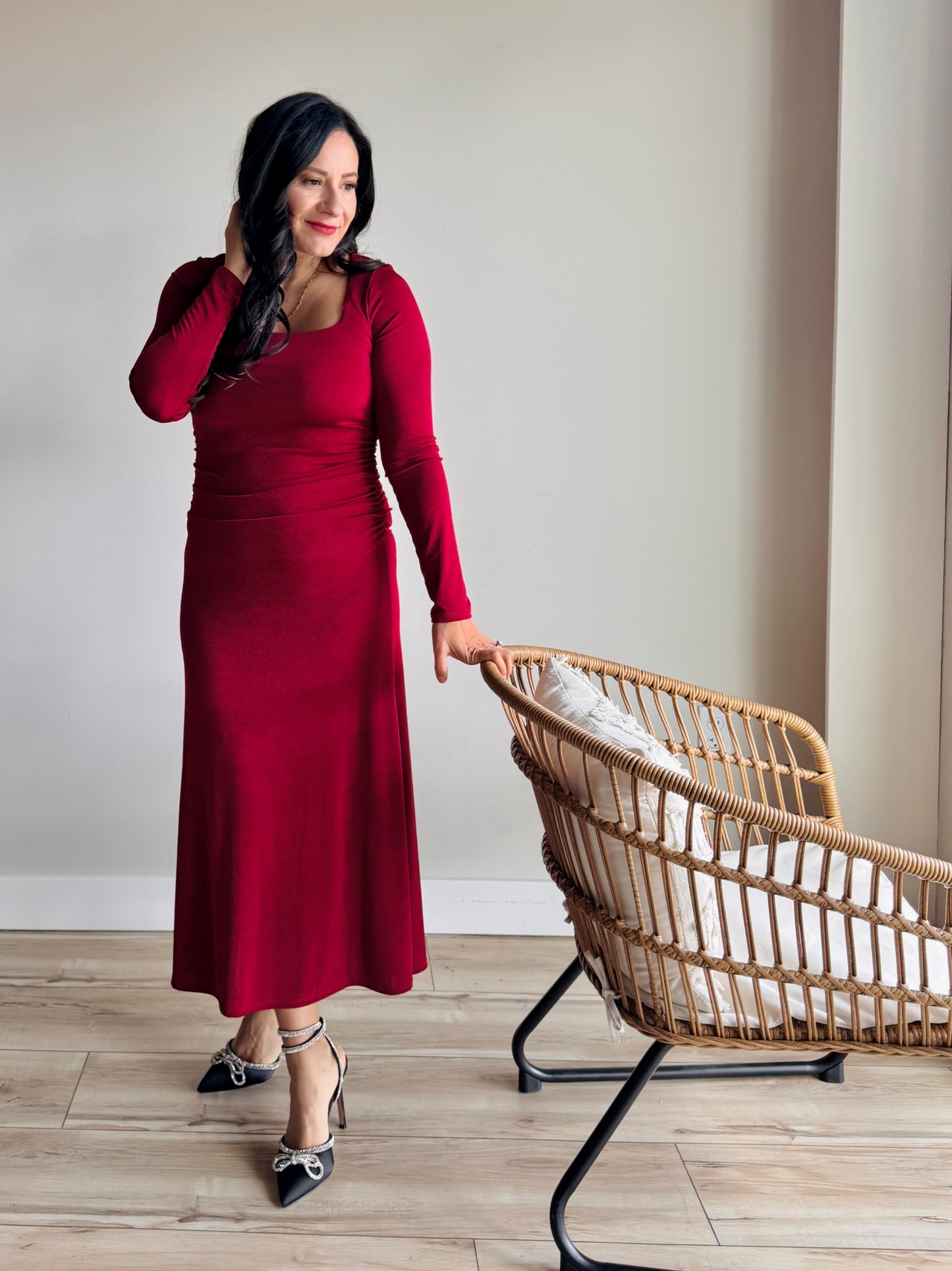 Fashion pose in Nikki square neck midi dress emphasizing chic square neckline and elegant midi length