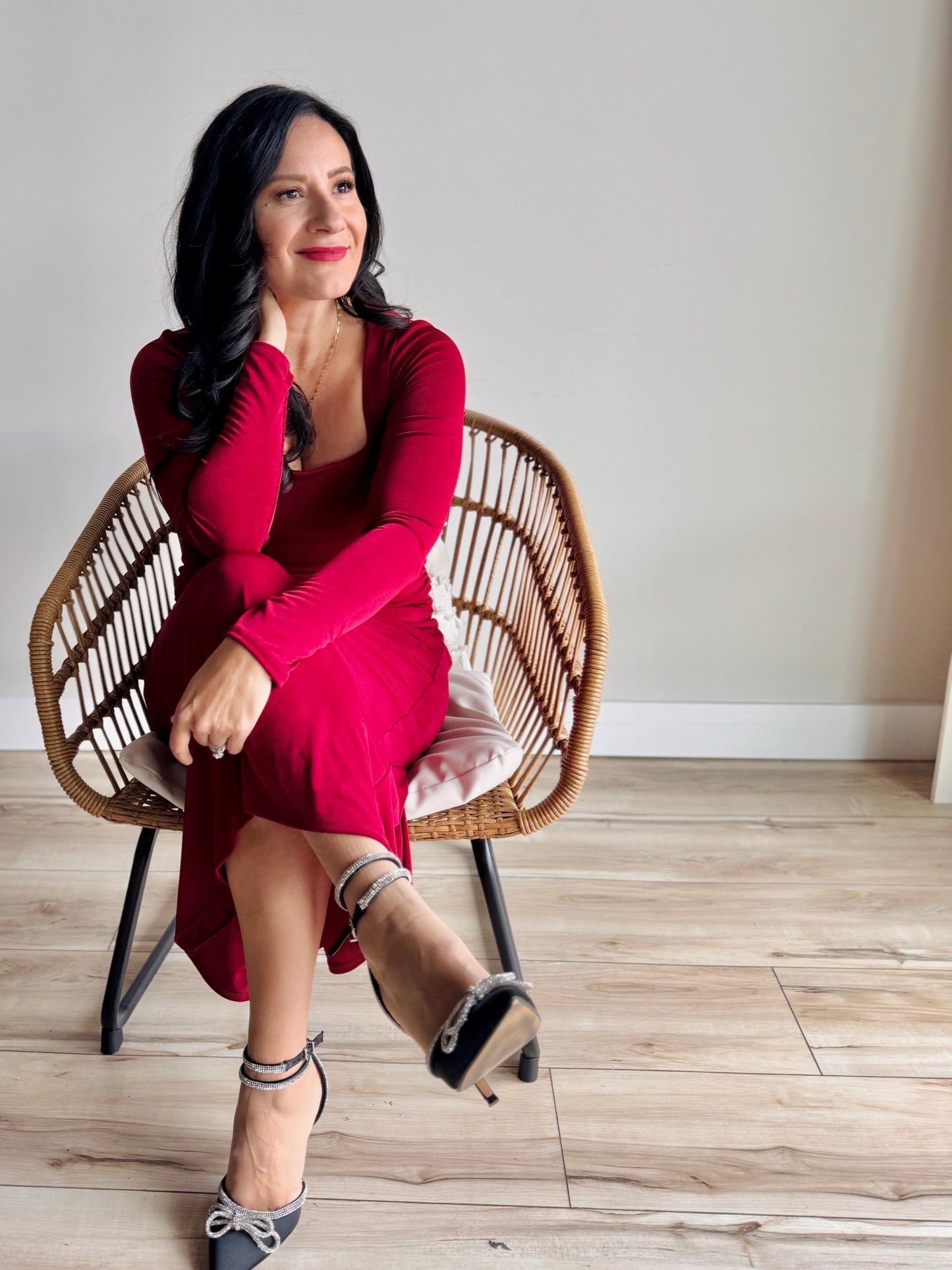 Styled pose wearing Nikki square neck midi dress showcasing versatile boutique look and flattering fit