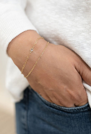 Gold welded permanent bracelet in Puyallup at 27 West boutique