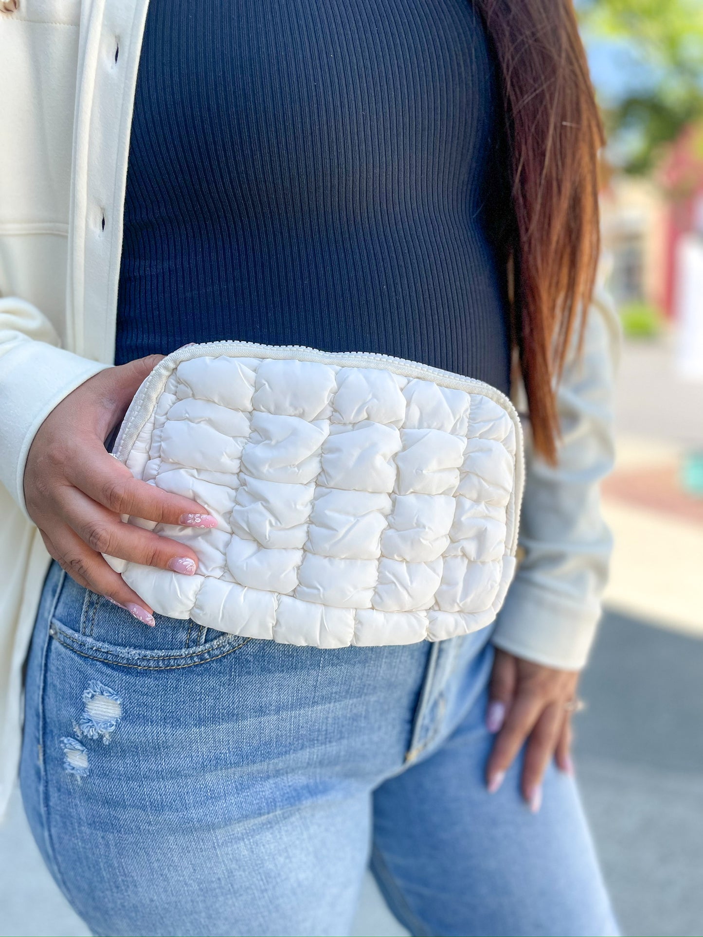 Close-up of Quilted Belt Bag in Ivory, focusing on quilted pattern and stitching details.
