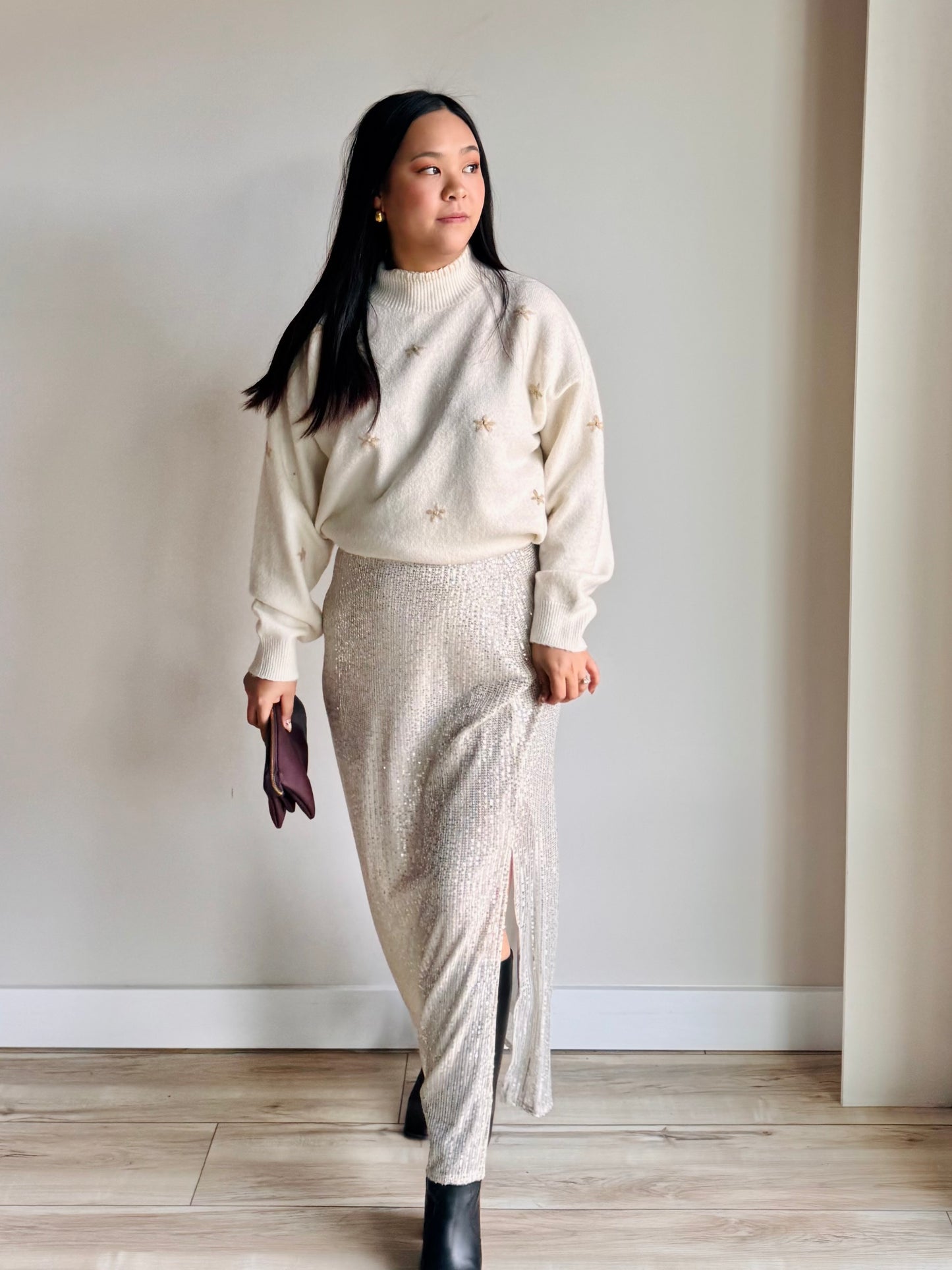 Fashion pose in Rihanna sequin maxi skirt emphasizing sparkling sequins and chic boutique styling