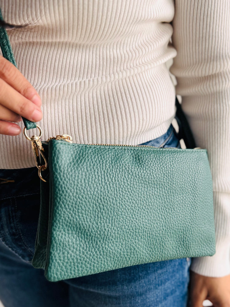 Back view of forest green Sedona purse with smooth vegan leather finish and clean stitching
