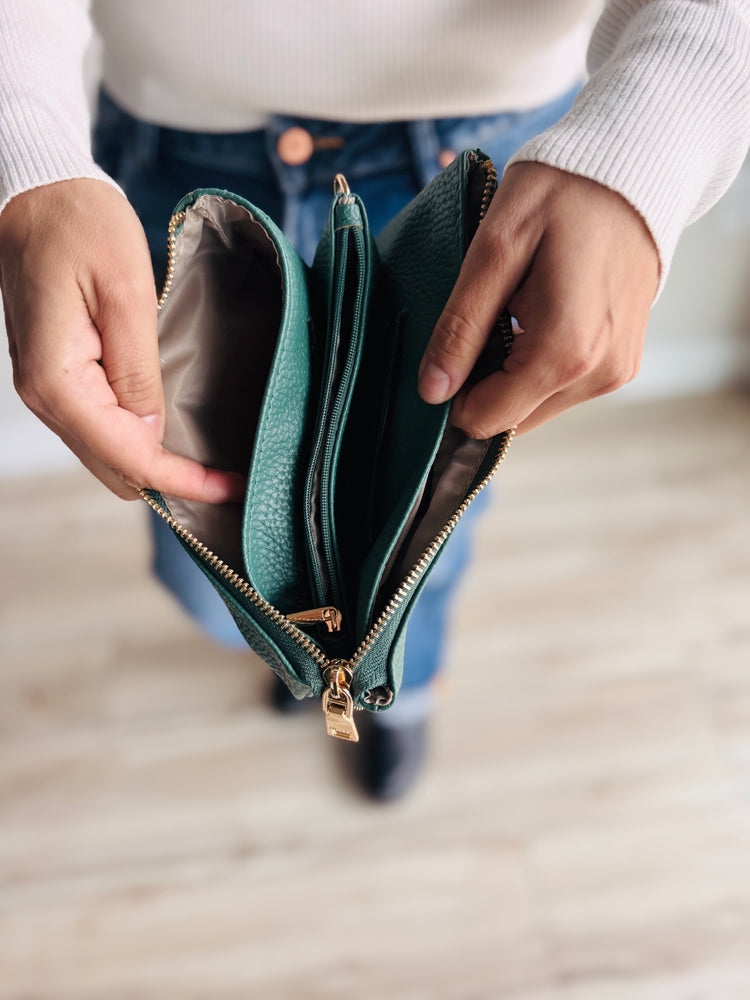 Open view of Sedona purse showing card slots, slip pockets, and center zipper compartment