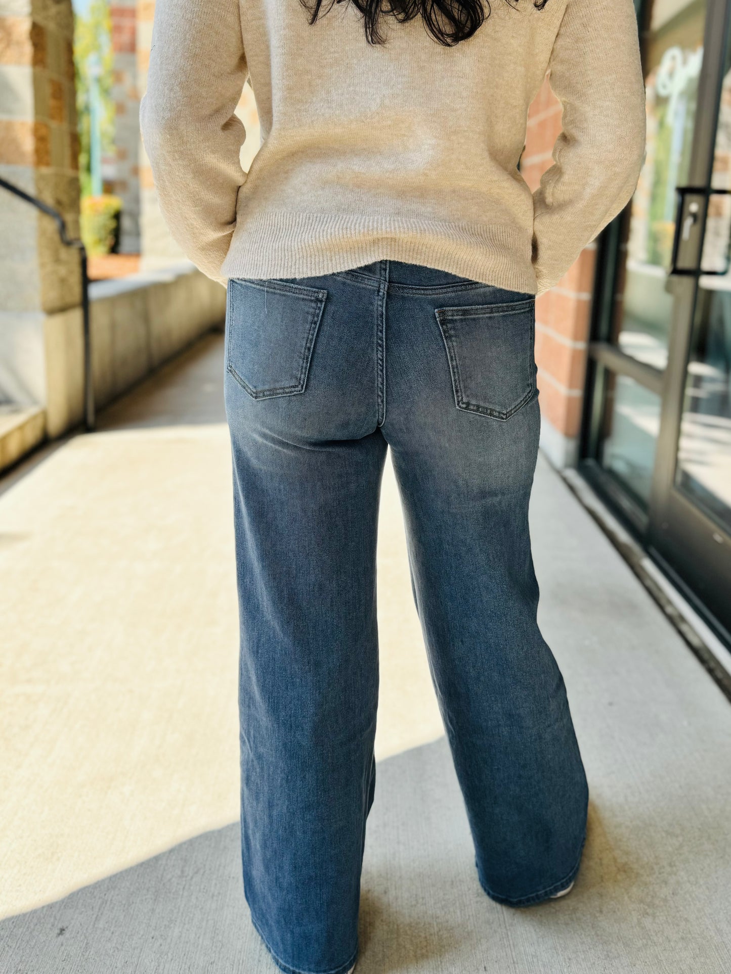 Back view of Shay High Rise Wide Leg Denim, emphasizing the flattering high-rise waist.
