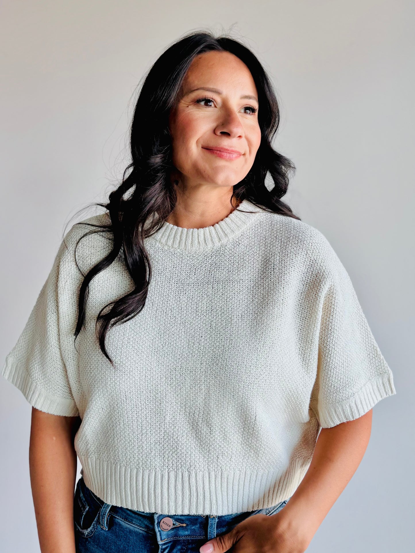 Woman wearing the Willow relaxed raglan sleeve sweater