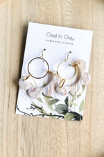 Clad in Clay $24